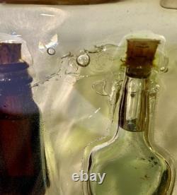 Antique Bottles With Liquid Encased In Resin One Of A Kind Masterpiece