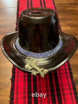 Artisan crafted pottery cowboy bank one of kind from Seagrove North Carolina