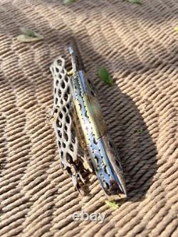 Artistic Scrolled one of a kind Damascus, Pocket Knife