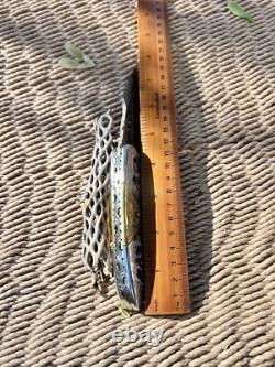 Artistic Scrolled one of a kind Damascus, Pocket Knife