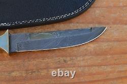 Custom made beautiful damascus collectable hunting knife one of a kind. 9028