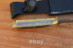 Custom made beautiful damascus collectable hunting knife one of a kind. 9028