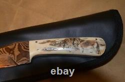 Damascus USA One-of-a-kind clip point with scrimshaw art by Sandra Brady WOLVES