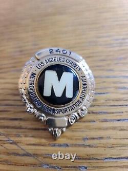 LACMTA-METRO BUS. CAP BADGE #2401. ONE OF A KIND RARE! Plus BONUS RTD badge