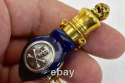 ONE OF A KIND Victorian Cobalt Blue Poison triangle bottle. Gold plated Skull cap