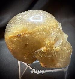 One Of A Kind Golden Rutile Skull Carving 247 Grams