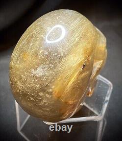 One Of A Kind Golden Rutile Skull Carving 247 Grams