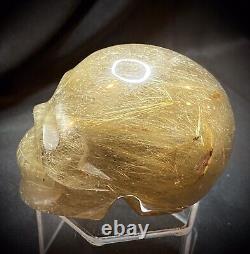 One Of A Kind Golden Rutile Skull Carving 247 Grams