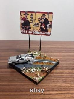 One-of-a-kind DeLorean movie diorama Gunman in the sunset with sign