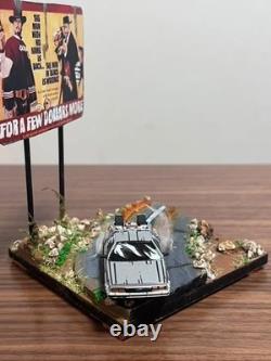 One-of-a-kind DeLorean movie diorama Gunman in the sunset with sign