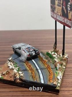 One-of-a-kind DeLorean movie diorama Gunman in the sunset with sign
