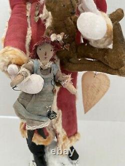 One-of-a-kind Debbee Thibault 1995 Santa holding rag doll and bear