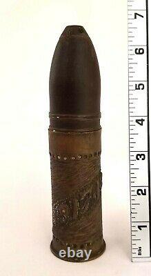 Original hand carved World War I Trench Art Artillery Shell one of a kind