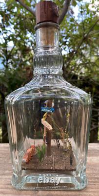 Unique art. Collectable bottle whimsey. One of a kind. Jack Daniels bottle