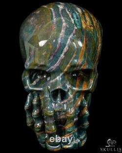 Le Penseur-5.7 Crâne en cristal de pierre de sang sculpté à la main et sculpture squelettique