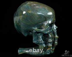 Le Penseur-5.7 Crâne en cristal de pierre de sang sculpté à la main et sculpture squelettique