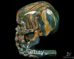Le Penseur-5.7 Crâne en cristal de pierre de sang sculpté à la main et sculpture squelettique