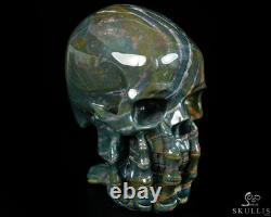 Le Penseur-5.7 Crâne en cristal de pierre de sang sculpté à la main et sculpture squelettique