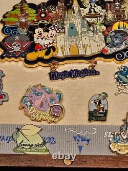 Membre du casting de Disney a construit une collection de 25 épingles pour sa carrière dans une boîte d'ombre unique