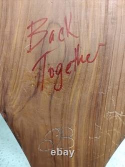 Sculpture en bois faite main, unique, cœur découpé et superposé, réunie.