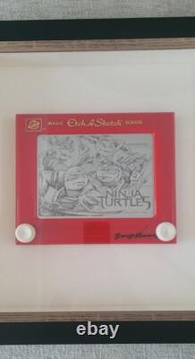 Une œuvre unique : croquis/dessin/boîte à ombres authentiquement signée sur un Etch-A-Sketch